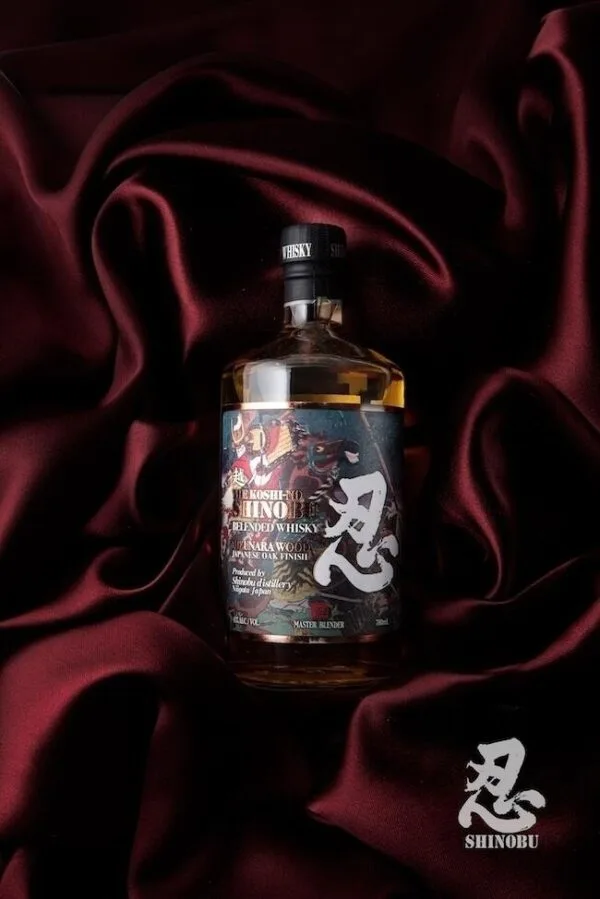 A bottle of the Shinobu blended whisky on red velvet